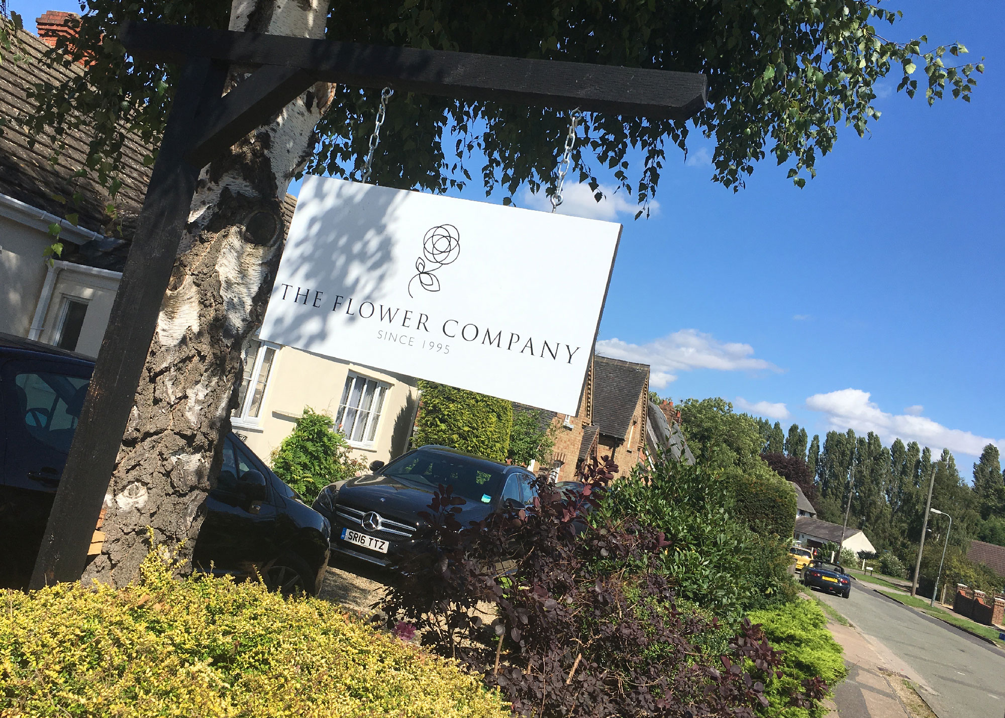 The Flower Company Hanging Sign